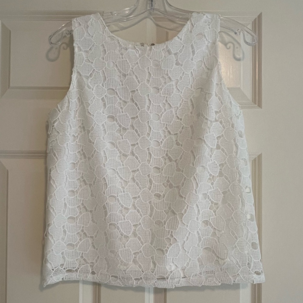 Calvin Klein elegant white lined top. Back hidden zipper. Falls below the waist